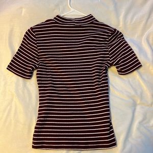 Worn a few times. Stripped shirt. Burgundy with black and white.